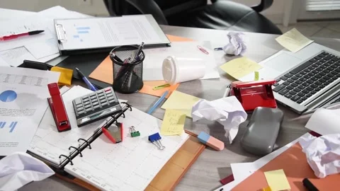 Messy and cluttered desk Stock Footage 253432129