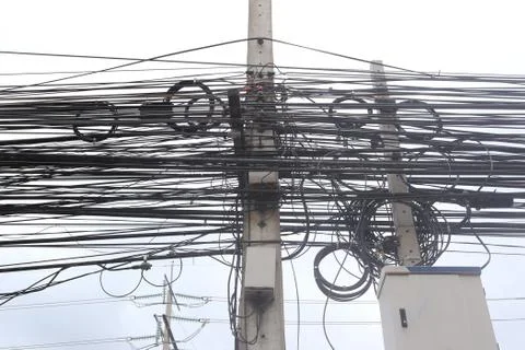 Messy cable electricity post. Stock Photos