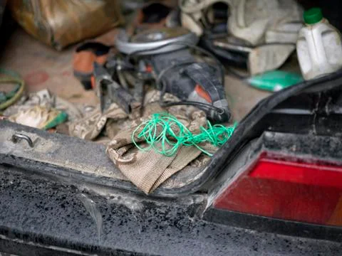 Messy car trunk with handtools Photos