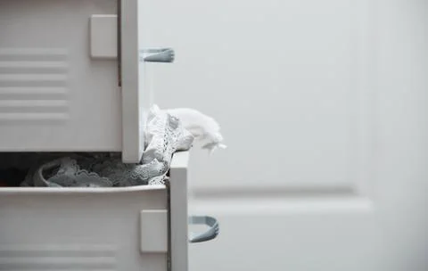 Messy clothes in wardrobe Stock Photos