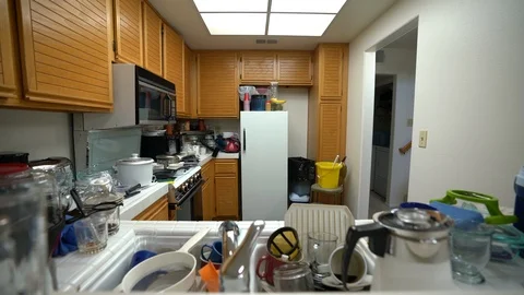 Messy Condo Kitchen Dolly Shot 스톡 동영상 93556842