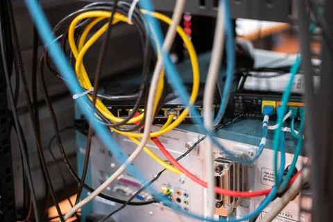 Messy connection computer and LAN cables power cord plugs. close up shot no p Photos