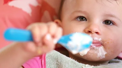 https://images.pond5.com/messy-eating-little-baby-footage-066910913_iconl.jpeg