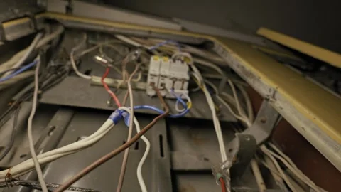 Messy Electrical Wiring System With Circuit Breakers And Exposed Cables Video stock 326036120