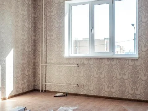 Messy empty room while repairing house panorama view Stock Photos
