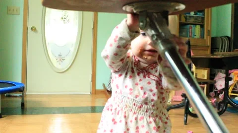 Messy faced toddler slowly makes way to camera Stock Footage 41652054