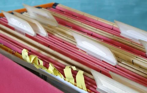Messy file folders and documents, red tape,bureaucracy concept Stock Photos