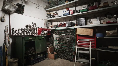 Messy Industrial Workshop Storage Room with Tools and Shelves Stock Footage 332138664