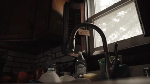 https://images.pond5.com/messy-kitchen-dirty-dishes-sink-footage-228811357_iconl.jpeg