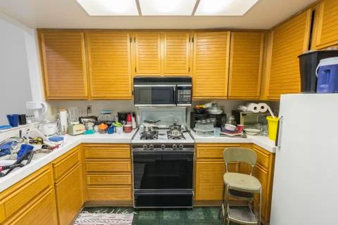 Messy Old Condo Kitchen Stock Photos