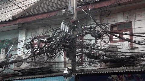 Messy power wires are tangled on the electrical pole, Stock Footage 344850802