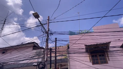 Messy power wires, tangled on electrical pole. Video stock 328338403