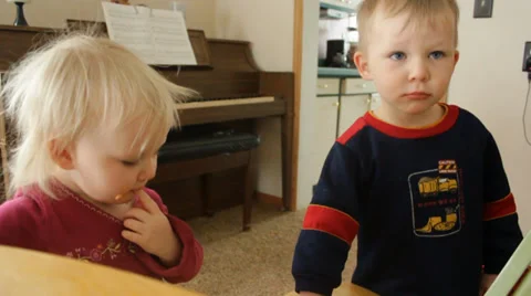 Messy siblings stand together with bedhead Stock Footage 35799299