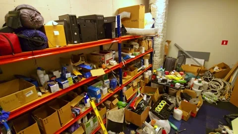 Messy Storage Room With Boxes, Tools and Gear - Industrial Shelf Organization Stock Footage 309788898