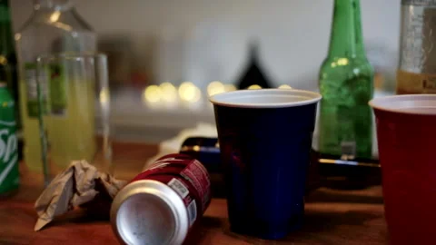 Messy Table Pan in Slow Motion at a College Party Stock Footage 206895070