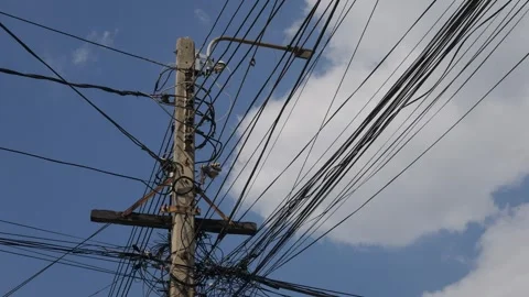 Messy Tangled Electrical Power Lines and Cables Video stock 327949549
