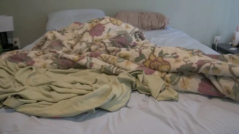 Messy, unmade bed, 4k 動画素材 81384201