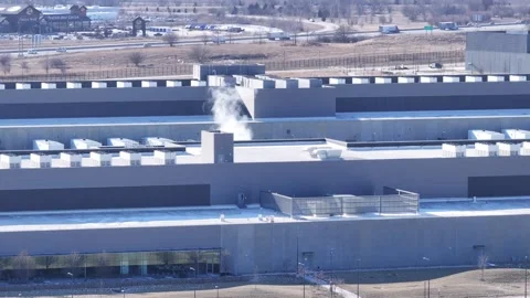 Meta Iowa Data Center Largest in the world - extreme telephoto follow Stock Footage 297913981