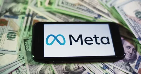 Meta Logo on iphone surrounded by $100 Bills. Meta Profits Layout. Stock Footage 169008187