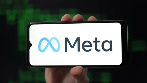 Meta Logo on a Smartphone on a Coding Animated Background Stock Footage 229677388