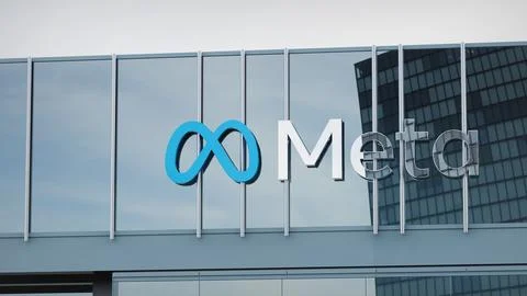 Meta Platforms Facebook Stock data presented on the logo of the office facade Stock-Fotos