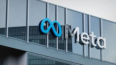Meta Platforms Facebook Stock data presented on the logo of the office facade Stock Photos