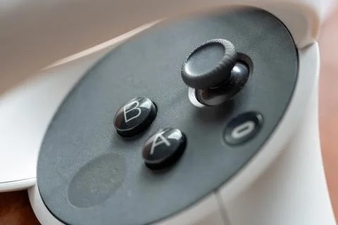 Meta Quest 2 VR headset controller controls object macro, extreme closeup d.. Foto stock