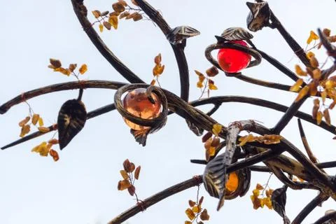 Metal Apple tree with amber elements. Stock Photos