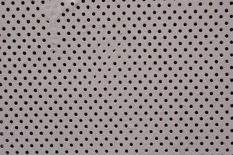 Metal background pattern with bstract metal texture plate hole. Stock Photos