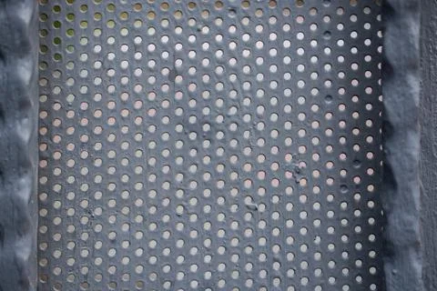 Metal background pattern with bstract metal texture plate hole. Stock Photos