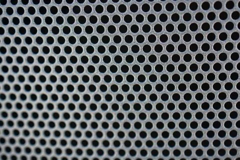 Metal background pattern with bstract metal texture plate hole. Stock Photos