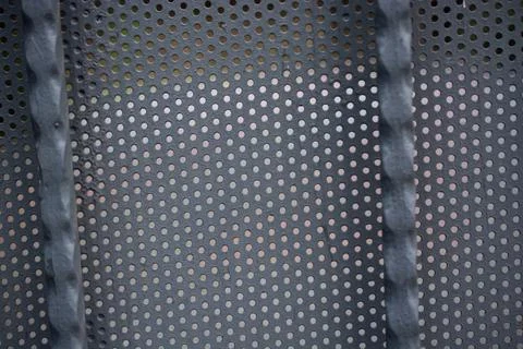 Metal background pattern with bstract metal texture plate hole. Stock Photos