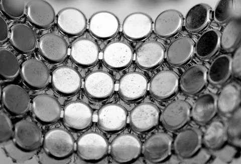 Metal background with round elements. Stock Photos