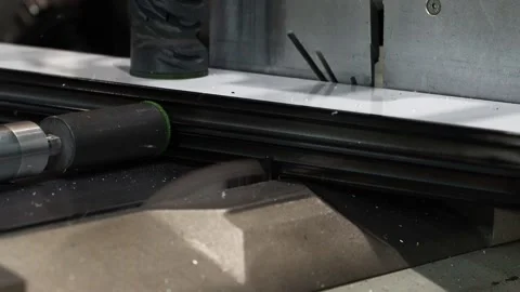 Metal bar being cut at 45 degree angle Stock Footage