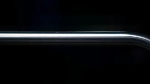 Metal bar with a dark background Stock Photos