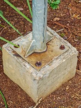 Metal base for pole with screws Stock Photos