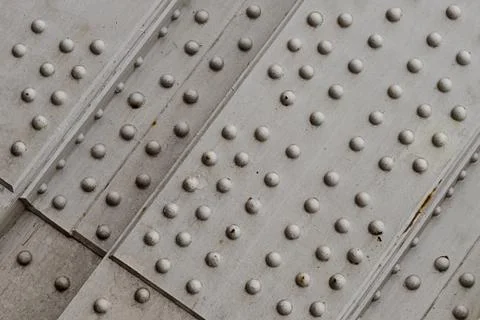 Metal base rivets part engineering technology grunge silver overprint surface Stock Photos