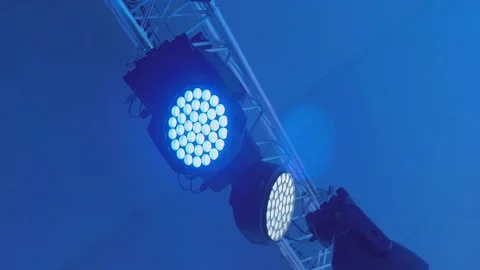 A metal beam under the ceiling with many lamps and spotlights for stage lighting Video stock 323852803