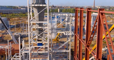 Metal beams of future workshops and the infrastructure under construction around Stock Footage 161992444