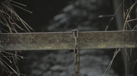 Metal beams over stream close up Stock Footage 58908061