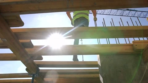 Metal beams, supports and columns on the construction Stock Footage 242590504