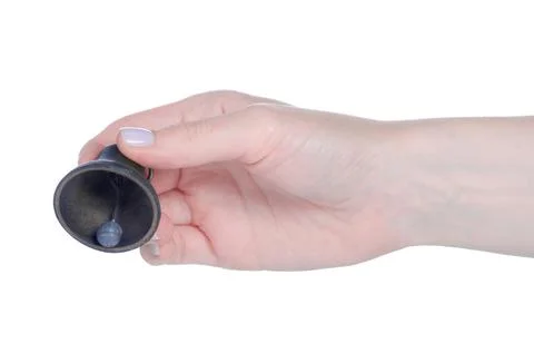 The metal bell in hand Stock Photos