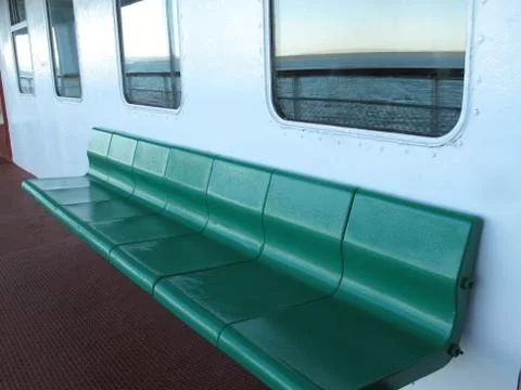 Metal bench on a ship Stock Photos
