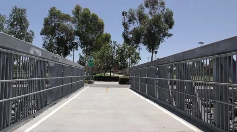 Metal bike path bridge over wash. Stock Footage 67558505