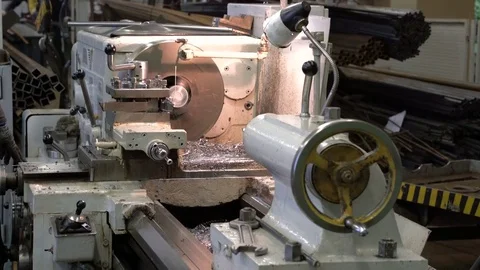 Metal blank machining process on lathe Stock Footage 70423924