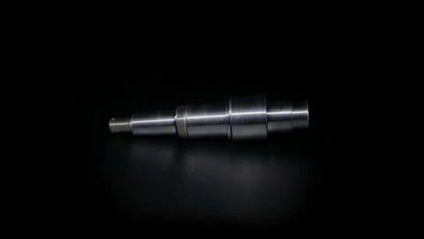 The metal bolt rotates on a black background. Bolt on a black background close 库存影片 167701757