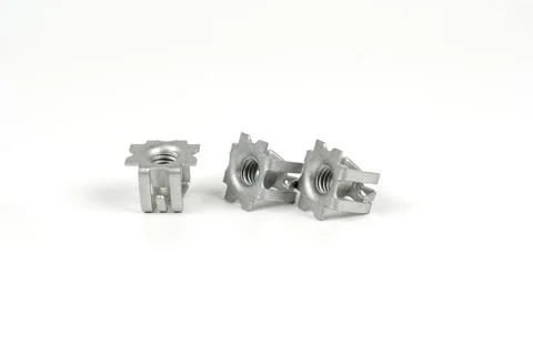 Metal brackets for self-tapping screws. Close up. Isolated on white backgroun Stock Photos