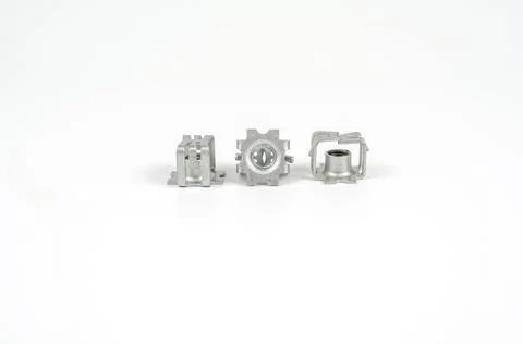 Metal brackets for self-tapping screws. Close up. Isolated on white backgroun Stock Photos