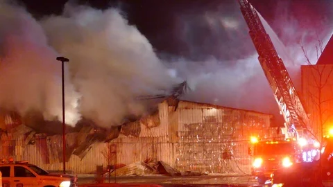 Metal building on fire Stock Footage 103632970