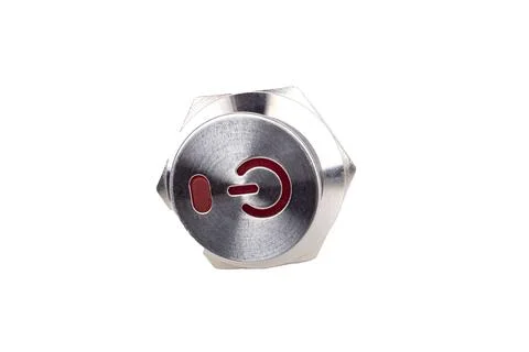 Metal button. background. it has a power symbol painted on it. close-up Stock Photos